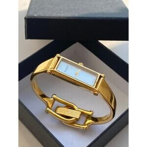 Gucci 1500L Gold-Tone Bangle Watch with White Dial